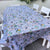 Grey Blue Afrikaans Tablecloth with sayings, flowers and suikerbossie birds - Something From Home - South African Shop