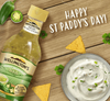 Wellington's Sweet Jalapeno Sauce 700ml bottle with chips and dip, perfect for adding flavor to meals.