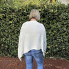 Cream knitted Winter Poncho with round neck by Cotton Road