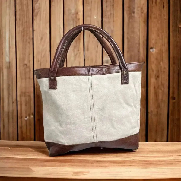 Woesmooi Shopper Bag with genuine leather inserts and "Net vir mooi mense" motto in canvas and leather details
