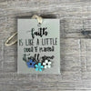 Wooden gift tag with faith quote and seed illustration