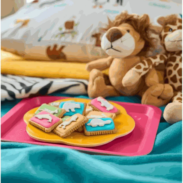 Pack of 12 Bakers Zoo Biscuits with colorful iced animal shapes on 150g packs