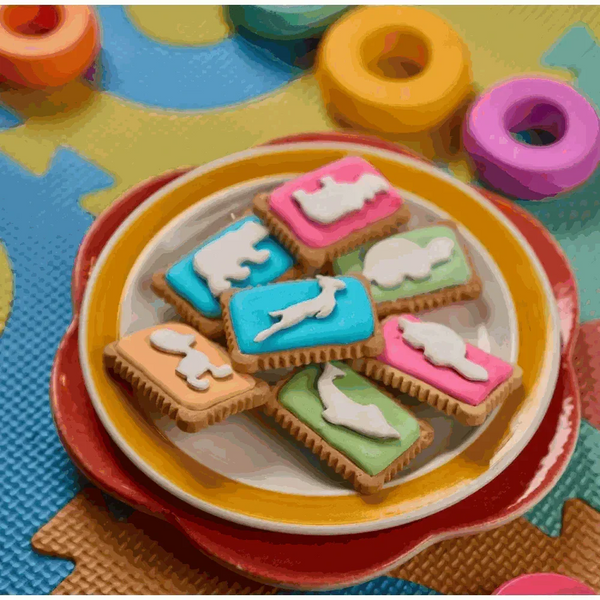 Pack of 12 Bakers Zoo Biscuits 150g with colorful iced animal shapes and vibrant backgrounds