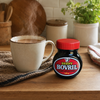 Beefy Bovril 125g jar beside a hot savoury Bovril drink