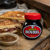 Beefy Bovril 125g jar served with a toasted sandwich and gravy
