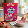 Kellogg's Strawberry Rice Krispies cereal beside a freshly served breakfast bowl